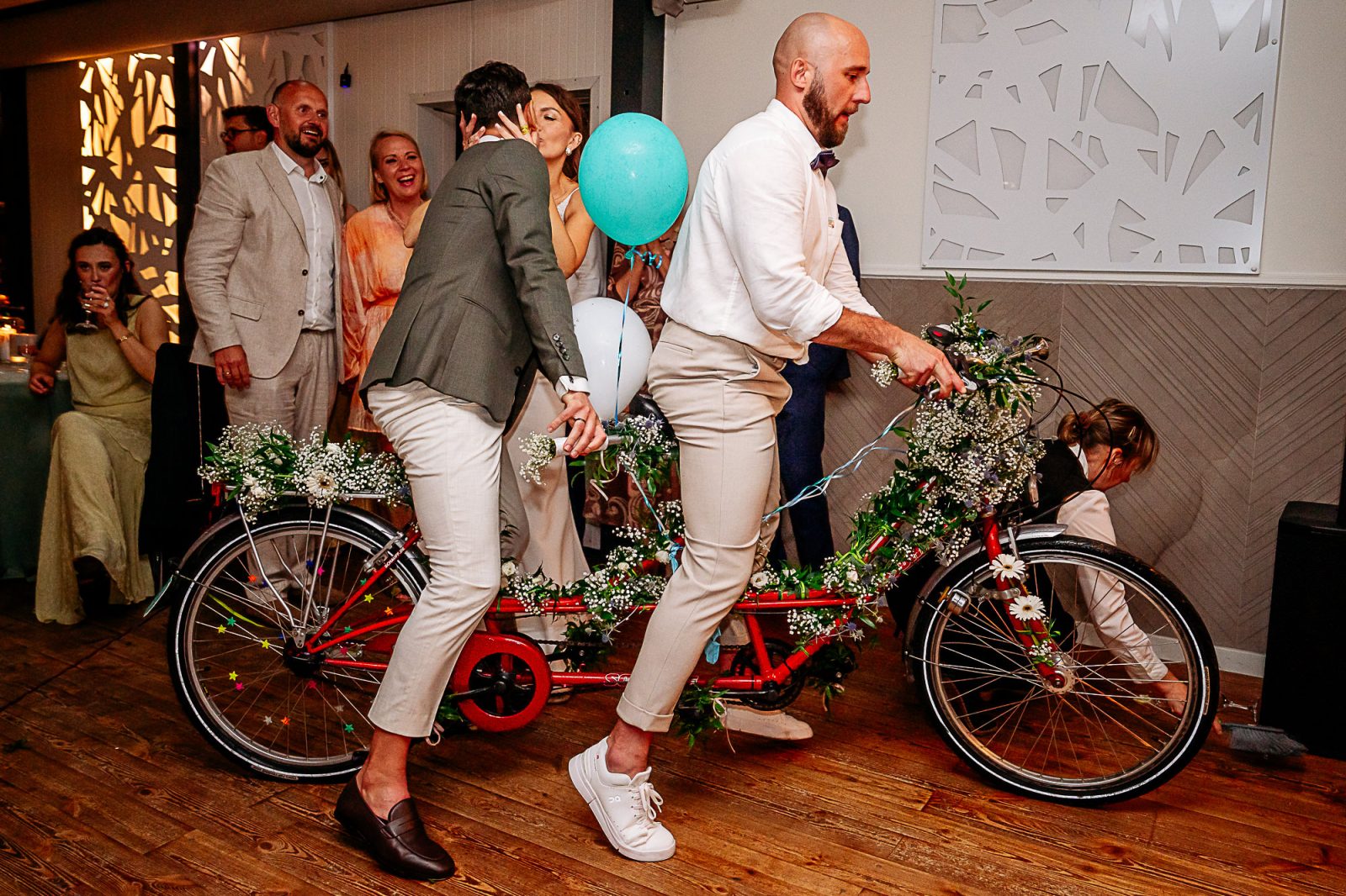 wedding party groom on the bikeauthentic wedding photography
