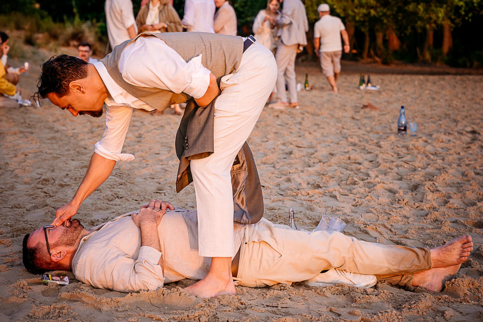  emotional wedding photography sunrise guest asleep on the beach