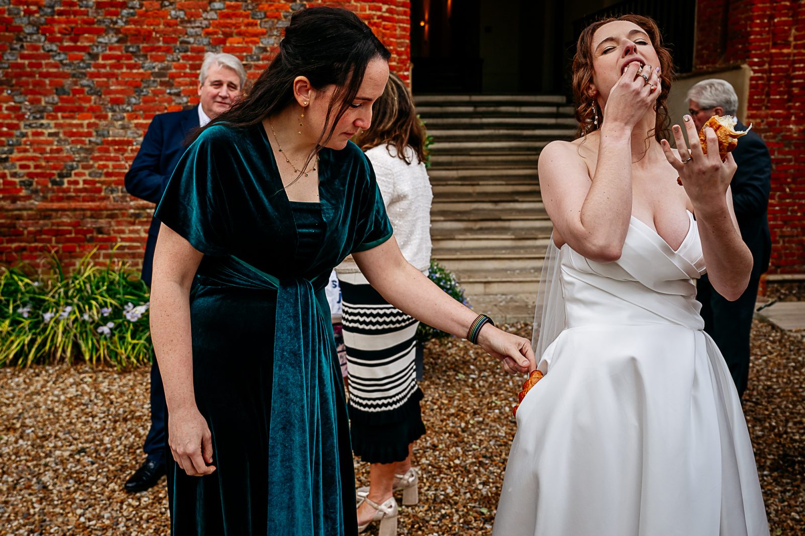 Bride eating croissant Farnham Castle