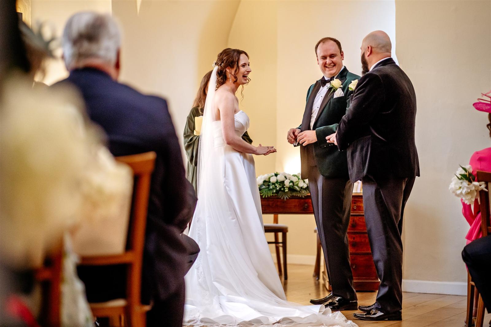  Farnham Castle Wedding ceremony ring exchange