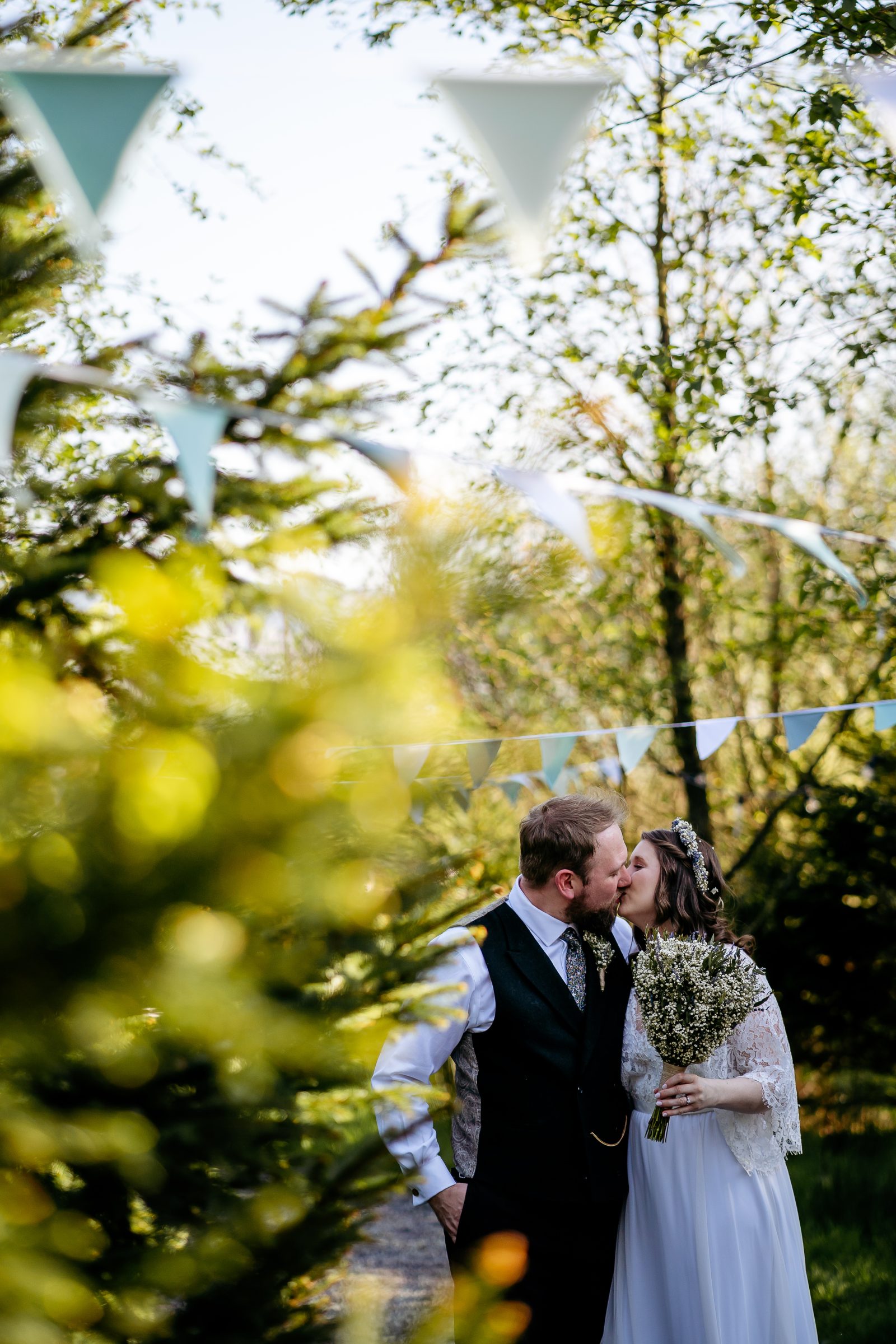 couple getting married at Bowland Tipis Wedding Photographer